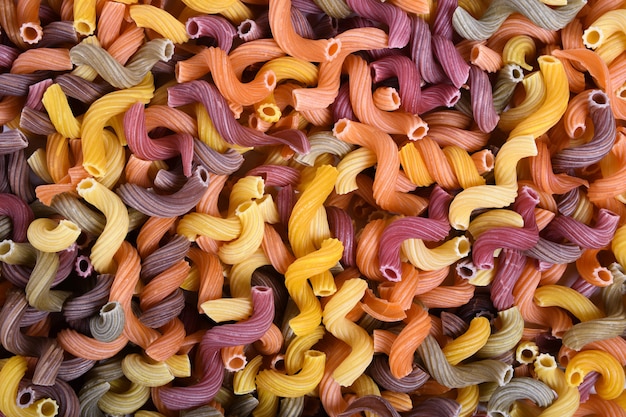 Foto kleurrijke rauwe pasta achtergrond