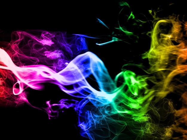 Foto kleurrijke rook op donkere achtergrond