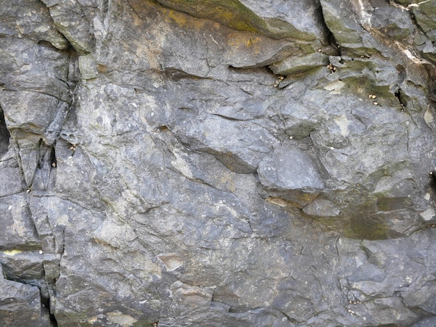 Kliffen en heuvels rotsen canyon grote stenen schoonheid in de natuur Vakantie reizen naar Ierland achtergrond