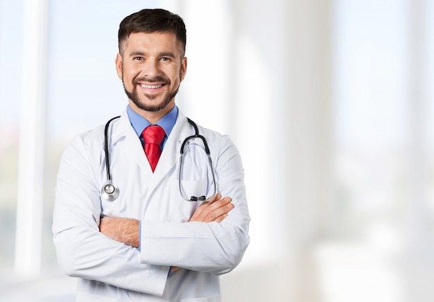 Foto knappe dokter portret op background