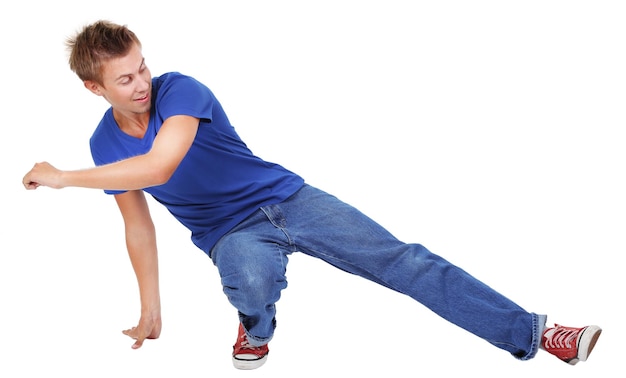 Foto knappe jonge man dansen geïsoleerd op wit