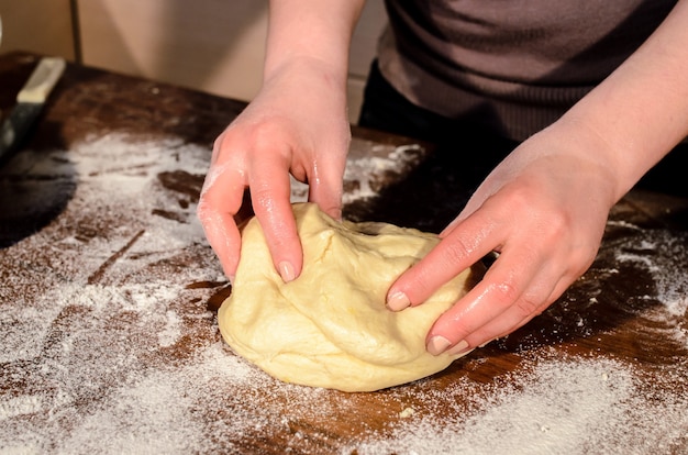 Kneading dough for bread baking.