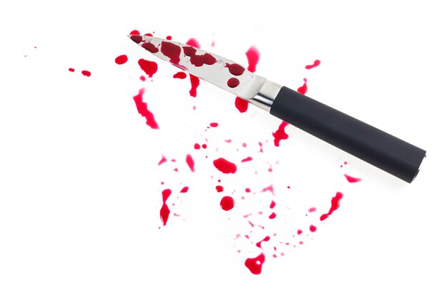 Knife and a drop of blood on white background.