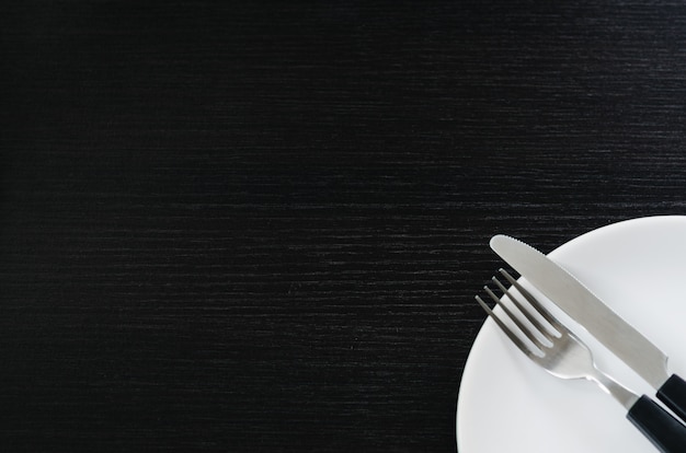 Photo knife and fork on a plate