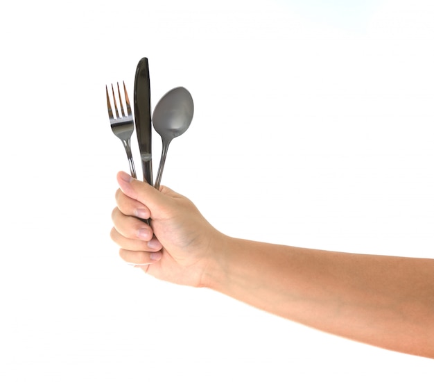 Knife, Fork and spoon held by a man's hands isolated