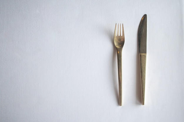 Knife and fork on the table