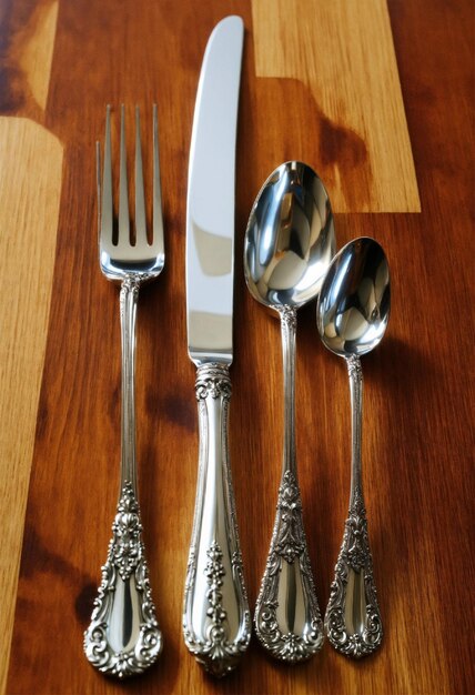 a knife and spoon are on a table with a knife and spoon