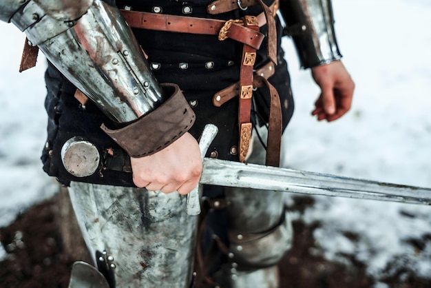 A knight holding a sword in his hand