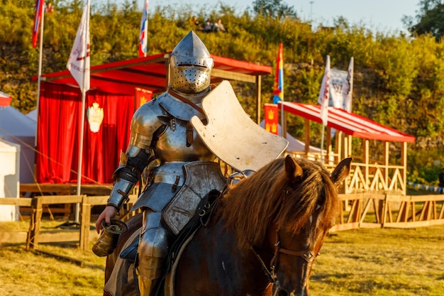 Knight in medieval armor on horseback. High quality photo