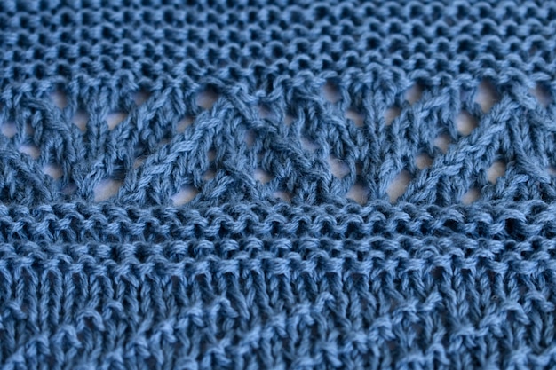 Knit openwork and horizontal patterns of natural wool blue