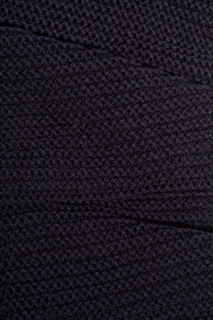 Knitted black scarf texture