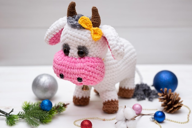 A knitted bull A soft toy as a symbol of the New Year