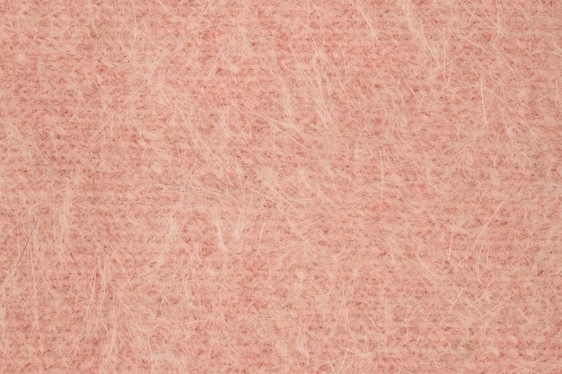 knitted fabric of machine knitting from angora wool in pink color
