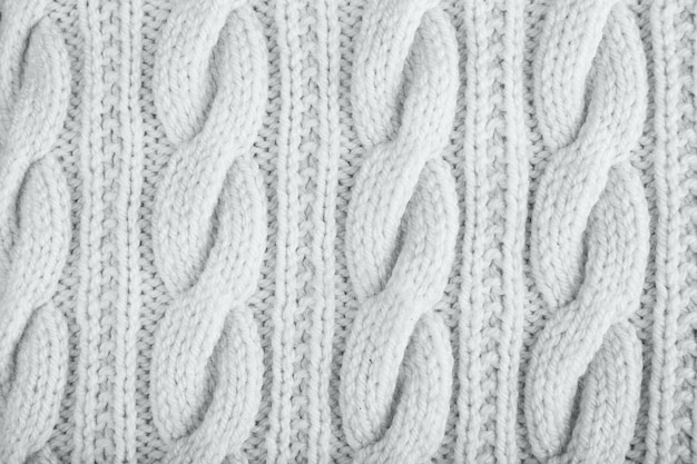 Knitted jersey background with a relief pattern