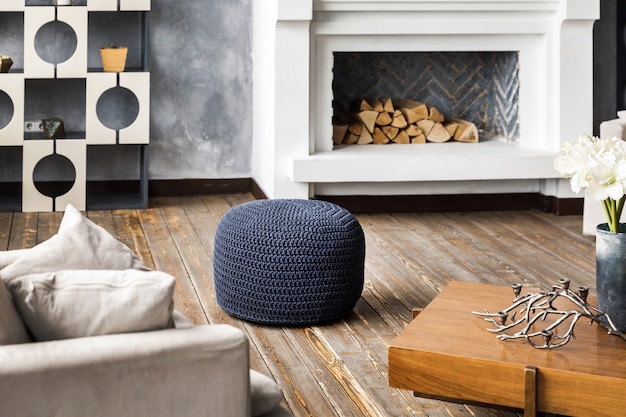 Knitted pouf on a modern living room