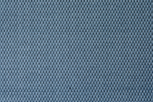 Knitted texture Texture of jacquard fabric with gray blue geometric pattern Crochet mosaic pattern