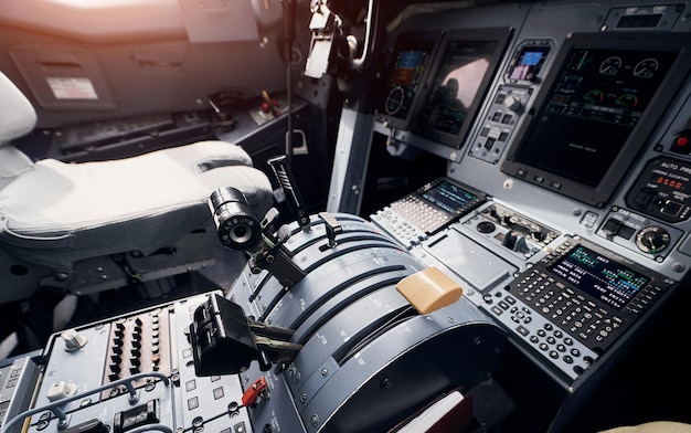 Knobs and buttons Close up focused view of airplane cockpit