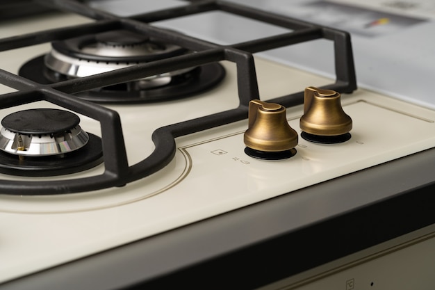 Foto knop schakelaar op de elektrische kachel close-up stove