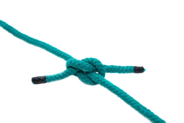 Knot on a cord closeup isolated on a white background