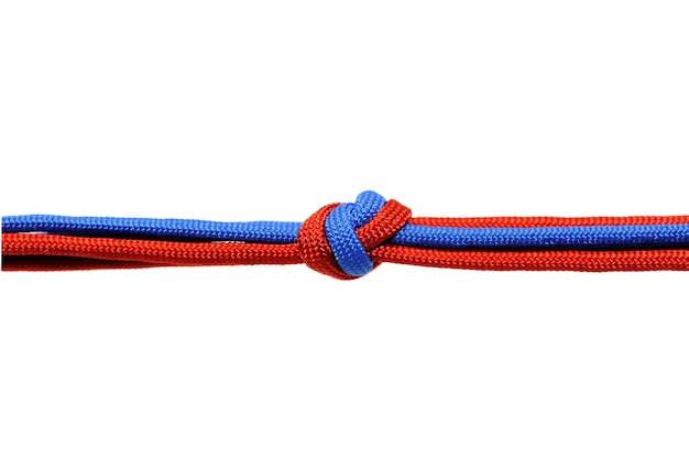 Knot  on a cord isolated on a white background .