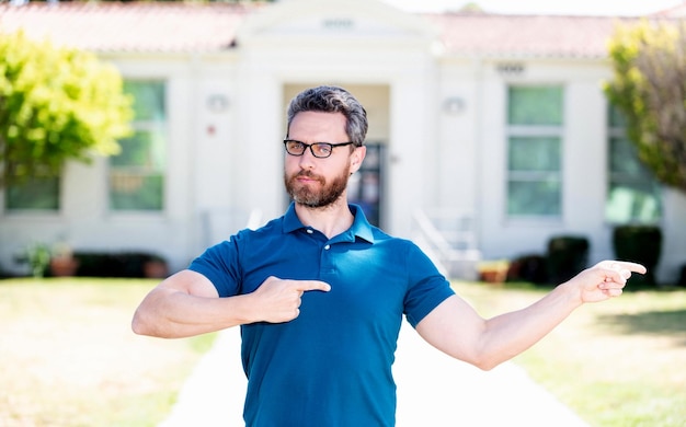 Knowledge and education mature teacher nerd looking smart proud man in eyeglasses directing