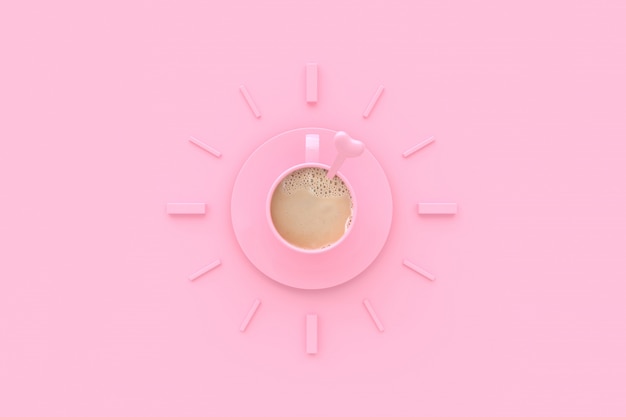 Koffie in roze creatieve kop voor tijd.