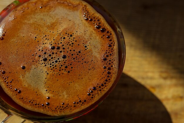 Koffie op een houten ondergrond Koffiekopje op een houten ondergrond Coffee