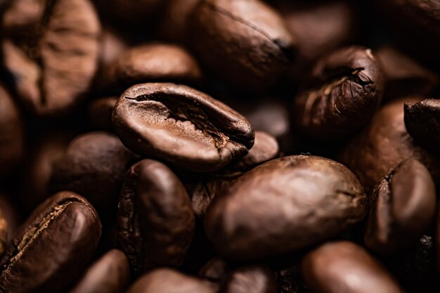 Koffiebonen achtergrond geroosterde kenmerkende boon met rijke smaak, beste ochtenddrank en luxe melange