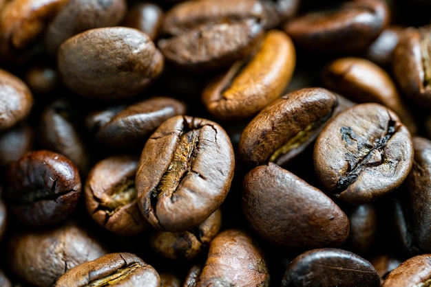 Koffiebonen De geroosterde textuur van koffiebonen