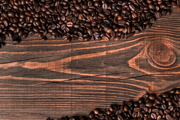 Koffiebonen op houten achtergrond