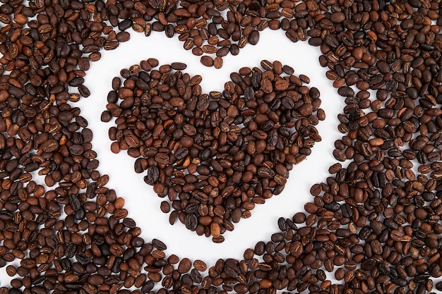 Foto koffieboon met hartvorm. ik hou van koffie