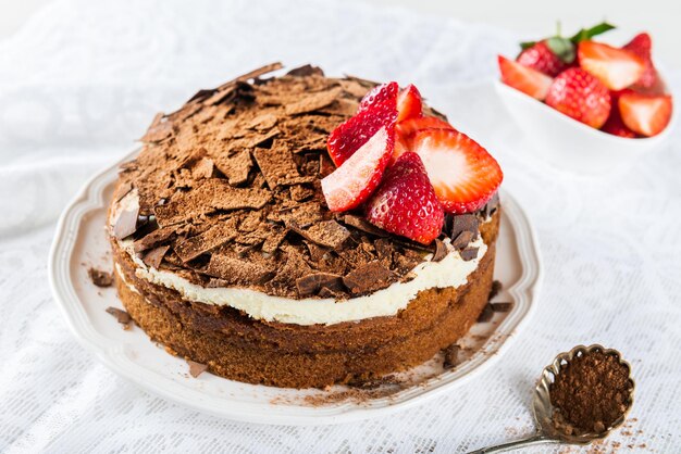 Foto koffiecake aardbeien en koffie