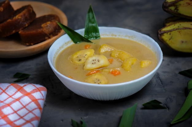 Kolak pisang or banana and sweet potato compote is popular Indonesian dessert made from banana