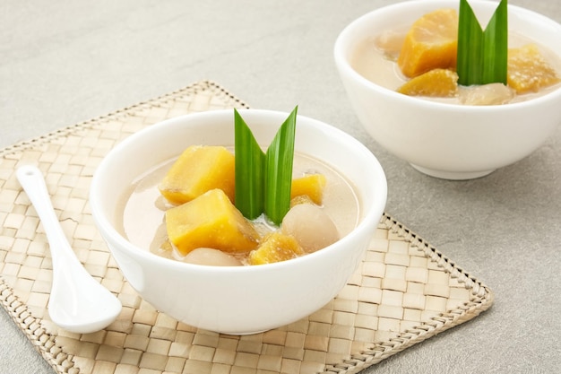 Kolak Ubi Indonesian traditional dessert made from sweet potato coconut milk sugar and pandanus