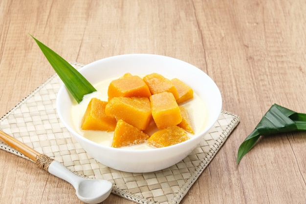 Kolak Waluh or Kolak Labu Kuning Indonesian traditional food Pumpkin in sweet coconut milk