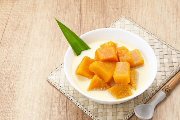 Kolak Waluh or Kolak Labu Kuning Indonesian traditional food Pumpkin in sweet coconut milk