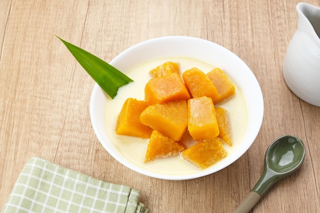 Kolak Waluh or Kolak Labu Kuning Indonesian traditional food Pumpkin in sweet coconut milk