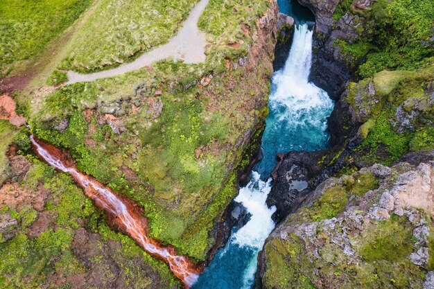 Kolugljufur gorge and Kolufoss waterfall in summer at Iceland