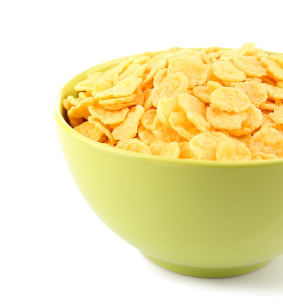 Kom met cornflakes op witte achtergrond