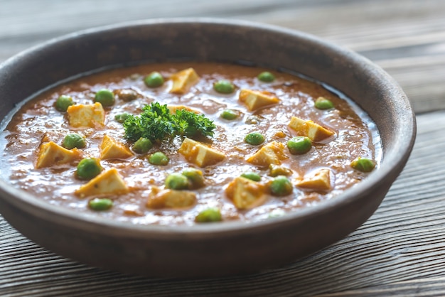 Kom van mattar paneer