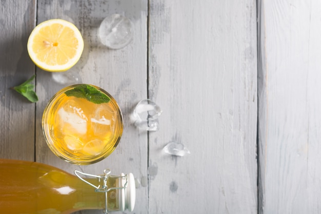 Kombucha lemonade is a fermented drink made from tea and lemon, produced using culture SCOBY