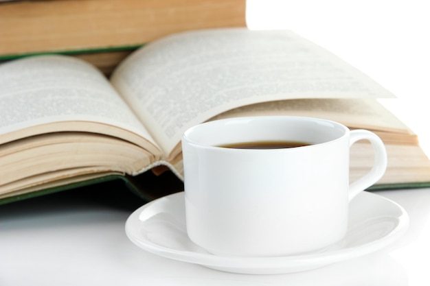 Kopje koffie en boeken close-up