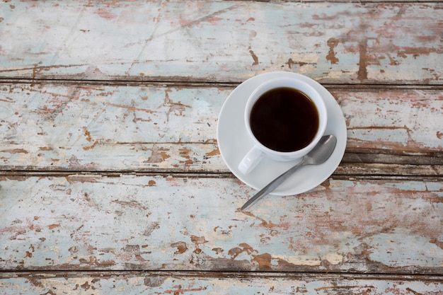 Kopje koffie met lepel