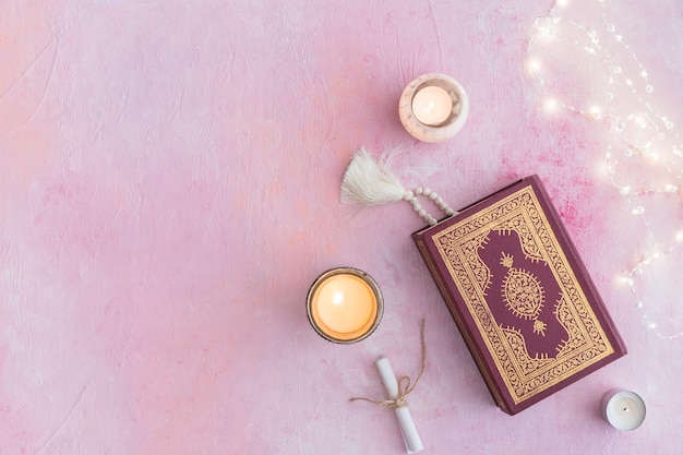 Photo koran with beads and candles