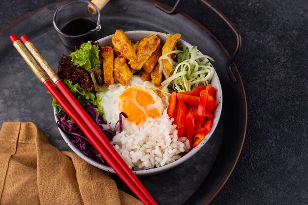 Korean bibimbap bowl with meat rice and salad