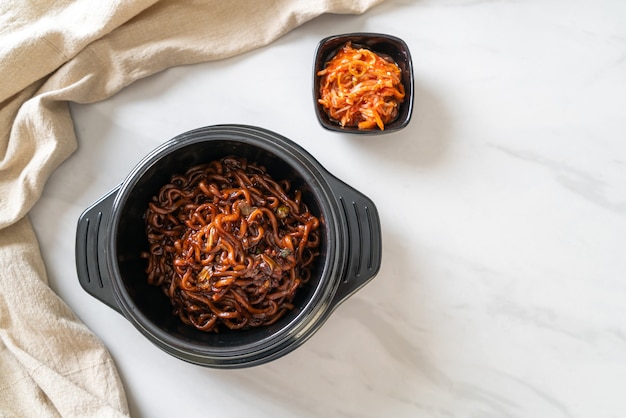 Korean black spaghetti or instant noodle with roasted chajung soybean sauce (chapagetti) - Korean food style