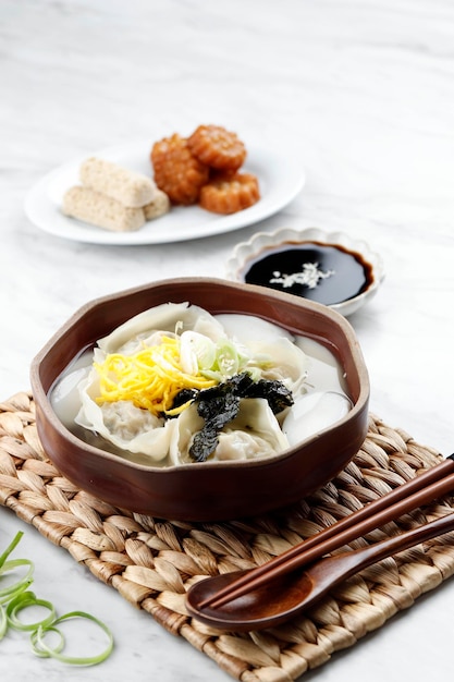 Korean Dumpling and Slice Rice Cake Soup Mandu Tteok Guk Traditional Soup for Festive Occasion