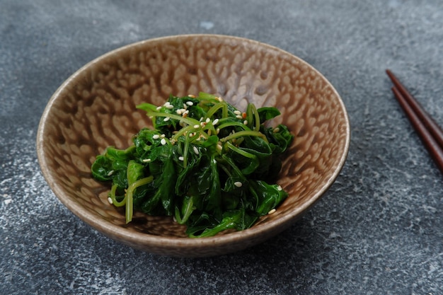 Korean food-mixed soy sauce and spinach with sesame,korean\
spinach side dish (sigeumchi namul)