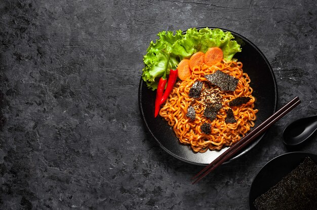 Photo korean hot spicy chicken flavor ramen instant noodles, stir fried noodle.