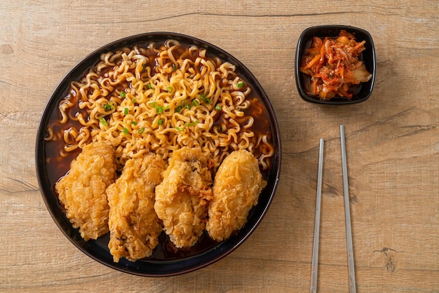 Korean instant noodles with fried chicken or Fried chicken ramyeon